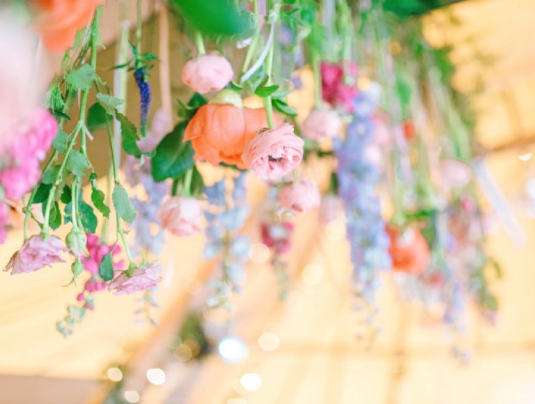 Flowers by lavender blue hanging in tipi at Brinkburn Northumberland