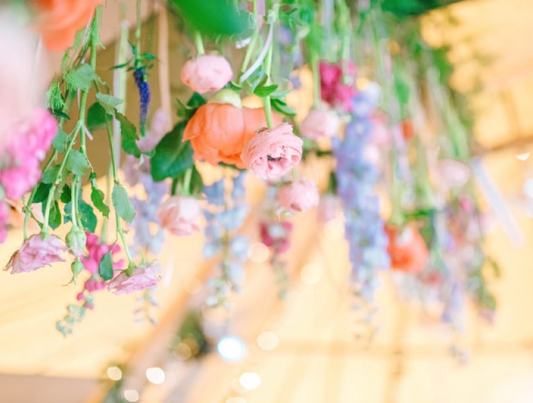 Flowers by lavender blue hanging in tipi at Brinkburn Northumberland 