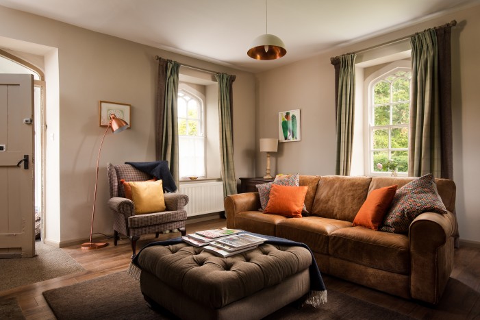 cosy sofas in lounge at dog friendly holiday cottage in Northumberland