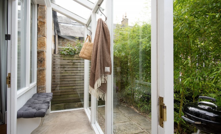 Entrance to Priory Cottage in English country garden