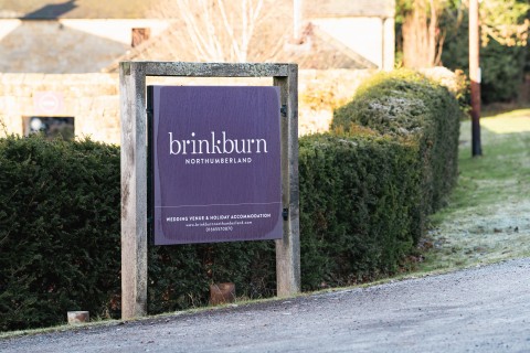 Brinkburn Northumberland sign frosted great for winter escapes