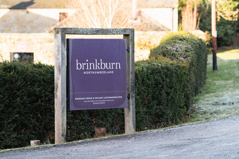 Brinkburn Northumberland sign frosted great for winter escapes