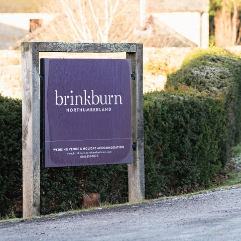 Brinkburn Northumberland sign frosted great for winter escapes