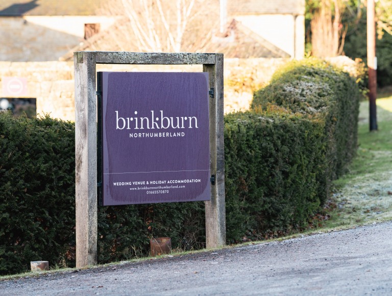 Brinkburn Northumberland sign frosted great for winter escapes