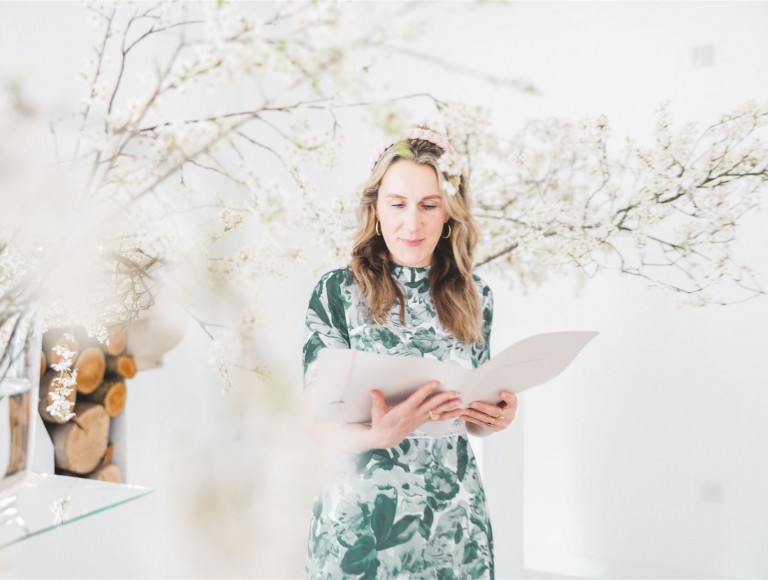 Wedding celebrant at Brinkburn Northumberland, white room with blossoms 