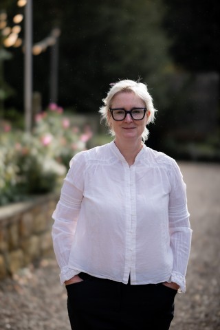Portrait shot of Emma wearing a white shirt