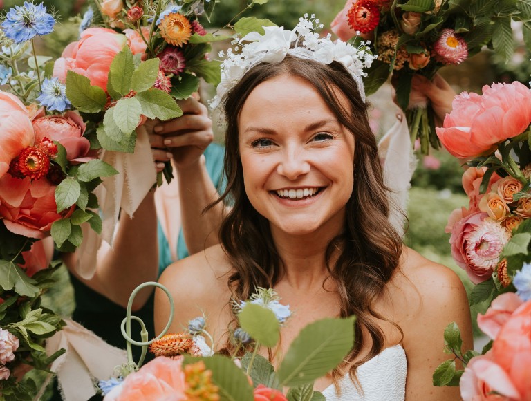 Bride at Brinkburn Northumberland with flowers