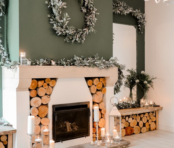 winter micro wedding fireplace in the garden room at Brinkburn Northumberland styled by Bels flowers