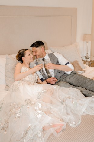 couple in the bridal suite at Brinkburn Northumberland after an intimate wedding in the garden room