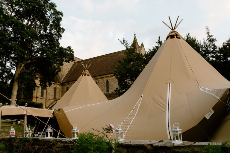 The tipi set for a wedding in front of the priory at Brinkburn Northumberland