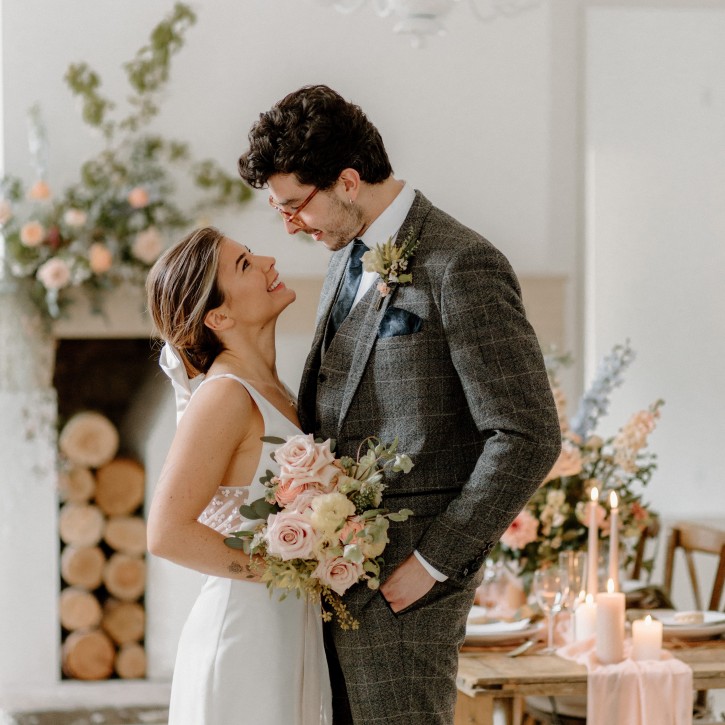 Bride and groom models in a white room photoshoot at Brinkburn