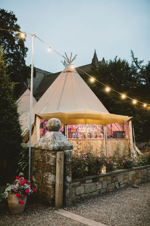 tipi lit up at Brinkburn Northumberland