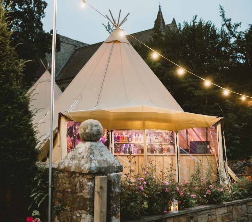 tipi lit up at Brinkburn Northumberland