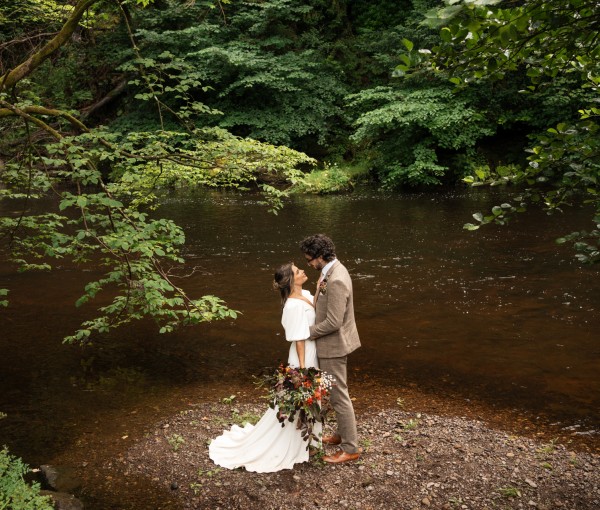 intimate ceremony at the riverside at Brinkburn Northumberland