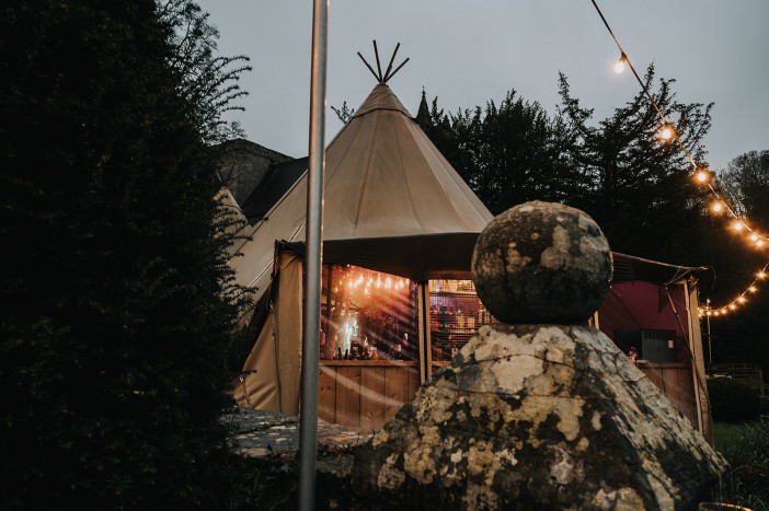 Brinkburn Northumberland tipi lit up at night 